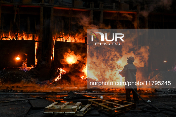 An employee works in an open-hearth furnace shop at Zaporizhstal PJSC in Zaporizhzhia, Ukraine, on November 13, 2024. NO USE RUSSIA. NO USE...