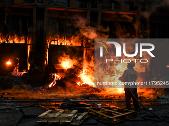 An employee works in an open-hearth furnace shop at Zaporizhstal PJSC in Zaporizhzhia, Ukraine, on November 13, 2024. NO USE RUSSIA. NO USE...