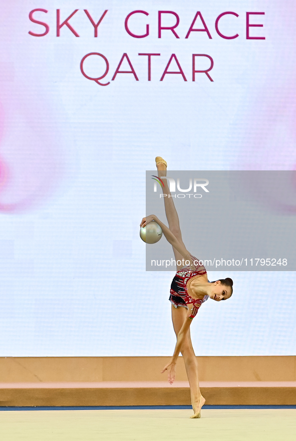 Marharyta Raksa of Belarus performs the ball exercise during the juniors apparatus finals of the International Rhythmic Gymnastics Tournamen...