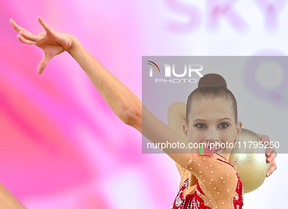 Marharyta Raksa of Belarus performs the ball exercise during the juniors apparatus finals of the International Rhythmic Gymnastics Tournamen...