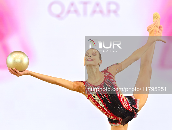 Marharyta Raksa of Belarus performs the ball exercise during the juniors apparatus finals of the International Rhythmic Gymnastics Tournamen...