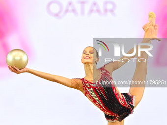 Marharyta Raksa of Belarus performs the ball exercise during the juniors apparatus finals of the International Rhythmic Gymnastics Tournamen...