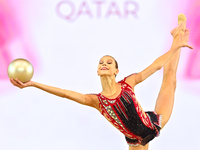 Marharyta Raksa of Belarus performs the ball exercise during the juniors apparatus finals of the International Rhythmic Gymnastics Tournamen...