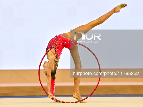 Ana Laikina of Russia performs the Hoop exercise during the juniors apparatus finals of the International Rhythmic Gymnastics Tournament ''S...