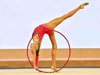 Ana Laikina of Russia performs the Hoop exercise during the juniors apparatus finals of the International Rhythmic Gymnastics Tournament ''S...