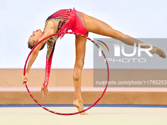 Ana Laikina of Russia performs the Hoop exercise during the juniors apparatus finals of the International Rhythmic Gymnastics Tournament ''S...