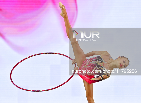 Ana Laikina of Russia performs the Hoop exercise during the juniors apparatus finals of the International Rhythmic Gymnastics Tournament ''S...