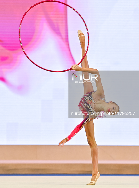 Ana Laikina of Russia performs the Hoop exercise during the juniors apparatus finals of the International Rhythmic Gymnastics Tournament ''S...