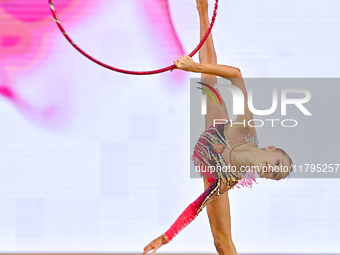 Ana Laikina of Russia performs the Hoop exercise during the juniors apparatus finals of the International Rhythmic Gymnastics Tournament ''S...