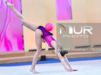 Vkioriia Seferian of Armenia performs the Ball exercise during the juniors apparatus finals of the International Rhythmic Gymnastics Tournam...