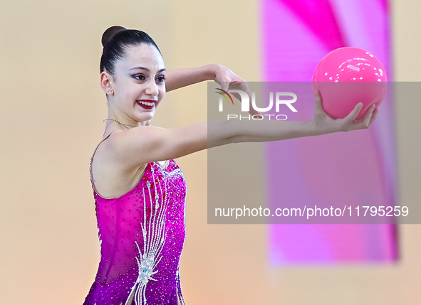 Vkioriia Seferian of Armenia performs the Ball exercise during the juniors apparatus finals of the International Rhythmic Gymnastics Tournam...