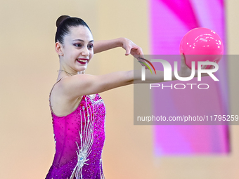 Vkioriia Seferian of Armenia performs the Ball exercise during the juniors apparatus finals of the International Rhythmic Gymnastics Tournam...