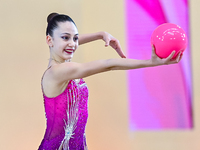 Vkioriia Seferian of Armenia performs the Ball exercise during the juniors apparatus finals of the International Rhythmic Gymnastics Tournam...