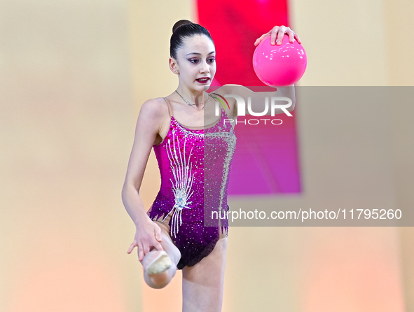 Vkioriia Seferian of Armenia performs the Ball exercise during the juniors apparatus finals of the International Rhythmic Gymnastics Tournam...