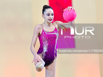 Vkioriia Seferian of Armenia performs the Ball exercise during the juniors apparatus finals of the International Rhythmic Gymnastics Tournam...