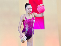 Vkioriia Seferian of Armenia performs the Ball exercise during the juniors apparatus finals of the International Rhythmic Gymnastics Tournam...