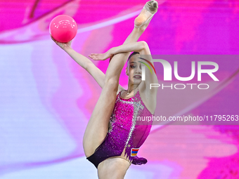 Vkioriia Seferian of Armenia performs the Ball exercise during the juniors apparatus finals of the International Rhythmic Gymnastics Tournam...