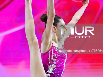 Vkioriia Seferian of Armenia performs the Ball exercise during the juniors apparatus finals of the International Rhythmic Gymnastics Tournam...