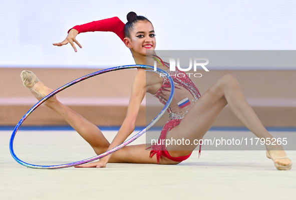 Anna Vakulenko of Russia performs the Hoop exercise during the juniors apparatus finals of the International Rhythmic Gymnastics Tournament...