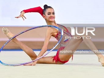 Anna Vakulenko of Russia performs the Hoop exercise during the juniors apparatus finals of the International Rhythmic Gymnastics Tournament...