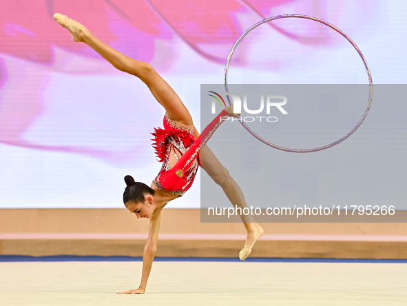 Anna Vakulenko of Russia performs the Hoop exercise during the juniors apparatus finals of the International Rhythmic Gymnastics Tournament...