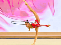 Anna Vakulenko of Russia performs the Hoop exercise during the juniors apparatus finals of the International Rhythmic Gymnastics Tournament...