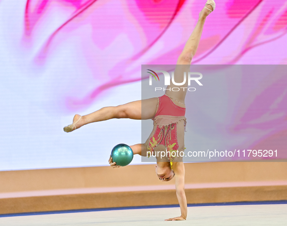 Sarah Al Ali of Syria performs the Ball exercise during the juniors apparatus finals of the International Rhythmic Gymnastics Tournament ''S...