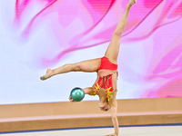 Sarah Al Ali of Syria performs the Ball exercise during the juniors apparatus finals of the International Rhythmic Gymnastics Tournament ''S...