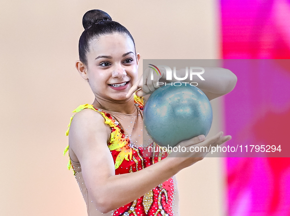 Sarah Al Ali of Syria performs the Ball exercise during the juniors apparatus finals of the International Rhythmic Gymnastics Tournament ''S...