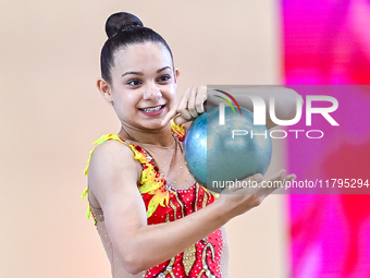 Sarah Al Ali of Syria performs the Ball exercise during the juniors apparatus finals of the International Rhythmic Gymnastics Tournament ''S...