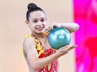 Sarah Al Ali of Syria performs the Ball exercise during the juniors apparatus finals of the International Rhythmic Gymnastics Tournament ''S...