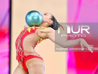 Sarah Al Ali of Syria performs the Ball exercise during the juniors apparatus finals of the International Rhythmic Gymnastics Tournament ''S...