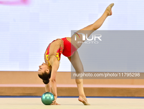 Sarah Al Ali of Syria performs the Ball exercise during the juniors apparatus finals of the International Rhythmic Gymnastics Tournament ''S...