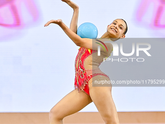 Sarah Al Ali of Syria performs the Ball exercise during the juniors apparatus finals of the International Rhythmic Gymnastics Tournament ''S...