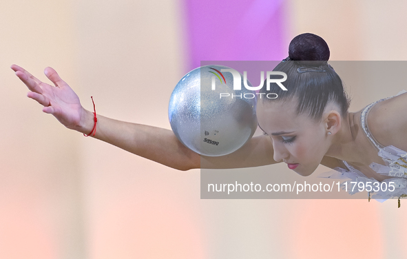 Nika Kostsina of Belarus performs the Ball exercise during the juniors apparatus finals of the International Rhythmic Gymnastics Tournament...