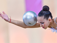 Nika Kostsina of Belarus performs the Ball exercise during the juniors apparatus finals of the International Rhythmic Gymnastics Tournament...