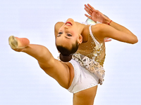 Nika Kostsina of Belarus performs the Ball exercise during the juniors apparatus finals of the International Rhythmic Gymnastics Tournament...