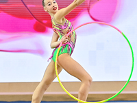 Dusica Zujko of Serbia performs the Hoop exercise during the juniors apparatus finals of the International Rhythmic Gymnastics Tournament 'S...