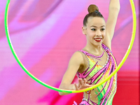 Dusica Zujko of Serbia performs the Hoop exercise during the juniors apparatus finals of the International Rhythmic Gymnastics Tournament 'S...