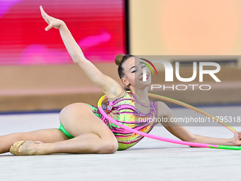 Dusica Zujko of Serbia performs the Hoop exercise during the juniors apparatus finals of the International Rhythmic Gymnastics Tournament 'S...