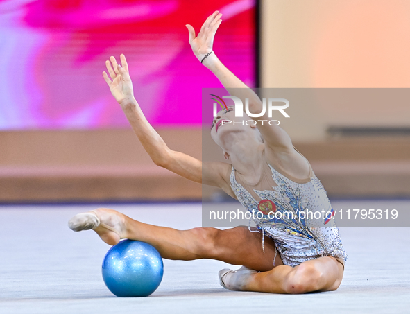 Karolina Pakhtusova of Russia performs the Ball exercise during the juniors apparatus finals of the International Rhythmic Gymnastics Tourna...