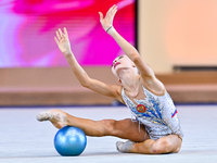 Karolina Pakhtusova of Russia performs the Ball exercise during the juniors apparatus finals of the International Rhythmic Gymnastics Tourna...