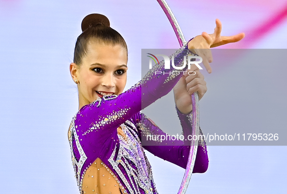 Marharyta Raksa of Belarus performs the Hoop exercise during the juniors apparatus finals of the International Rhythmic Gymnastics Tournamen...