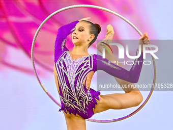 Marharyta Raksa of Belarus performs the Hoop exercise during the juniors apparatus finals of the International Rhythmic Gymnastics Tournamen...