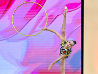 Nika Kostsina of Belarus performs the Hoop exercise during the juniors apparatus finals of the International Rhythmic Gymnastics Tournament...