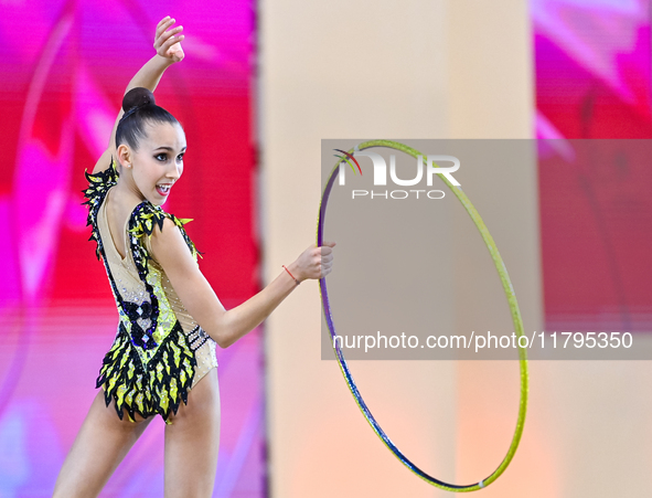 Nika Kostsina of Belarus performs the Hoop exercise during the juniors apparatus finals of the International Rhythmic Gymnastics Tournament...