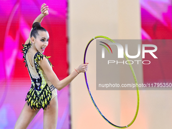 Nika Kostsina of Belarus performs the Hoop exercise during the juniors apparatus finals of the International Rhythmic Gymnastics Tournament...