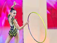 Nika Kostsina of Belarus performs the Hoop exercise during the juniors apparatus finals of the International Rhythmic Gymnastics Tournament...