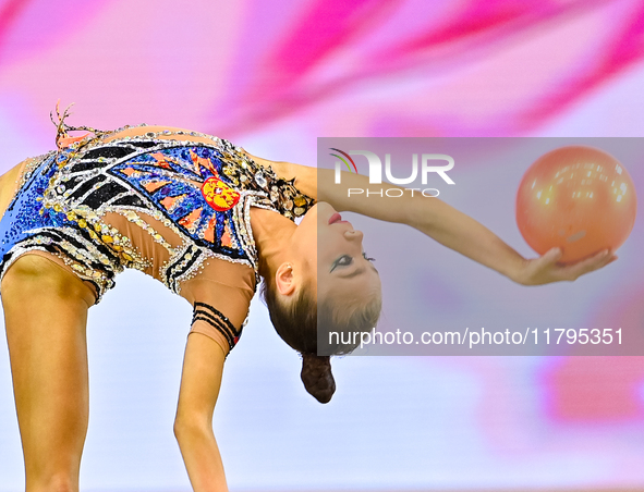 Ksenha Savinova of Russia performs the Ball exercise during the juniors apparatus finals of the International Rhythmic Gymnastics Tournament...