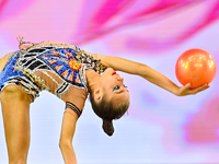 Ksenha Savinova of Russia performs the Ball exercise during the juniors apparatus finals of the International Rhythmic Gymnastics Tournament...